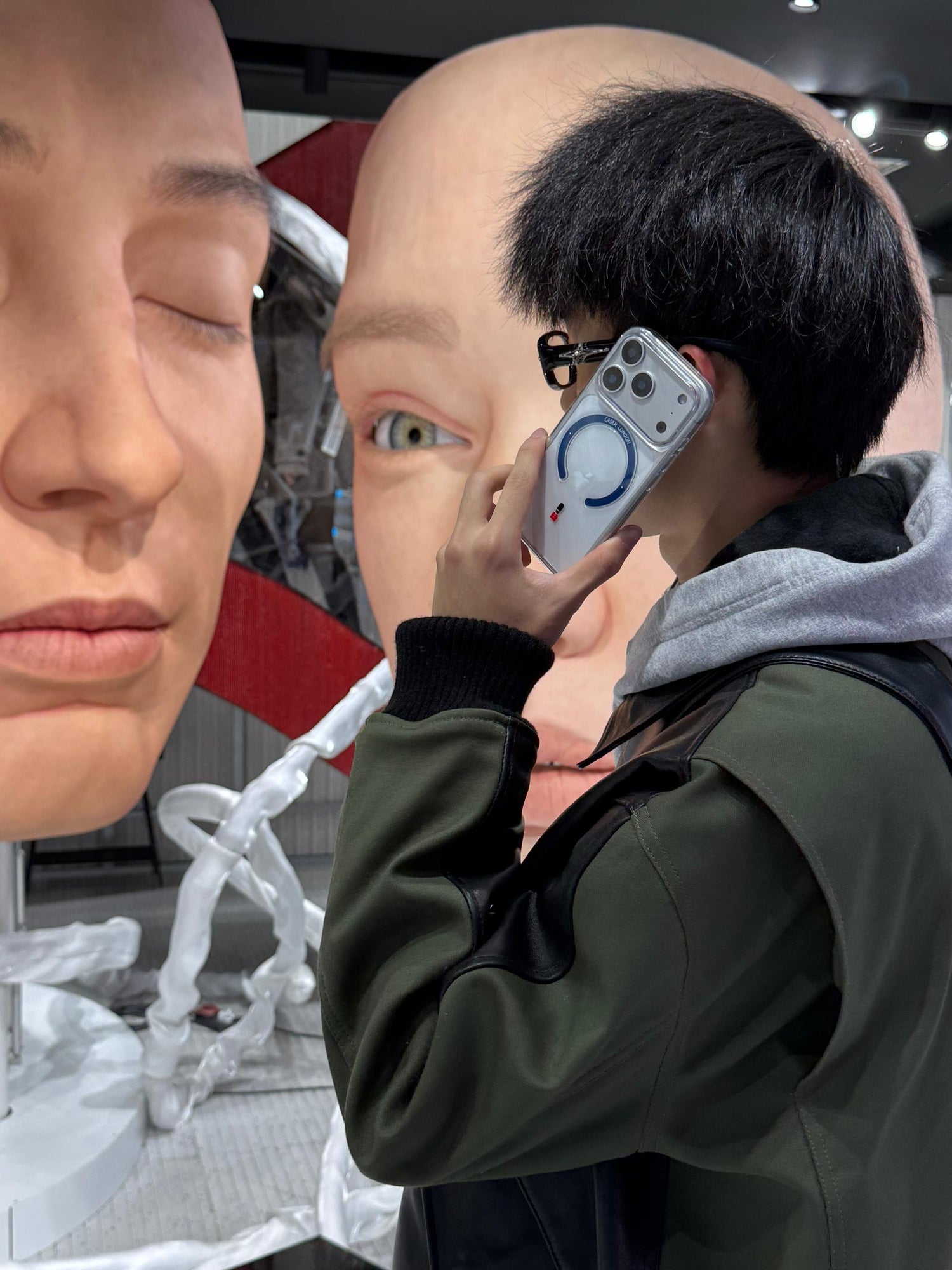 CASER LONDON the iconic case with guard icon on iPhone 17 pro hold by model