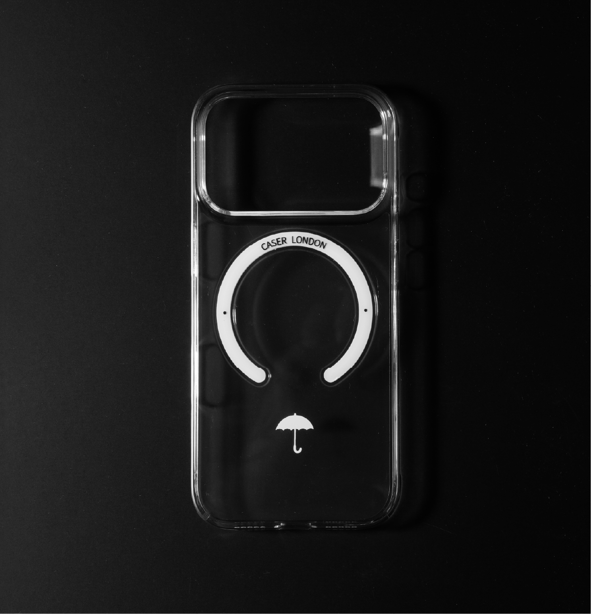 CASER LONDON Ultra slim clear iphone 17 pro case with umbrella icon and white magsafe charging ring